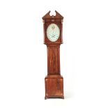 JOSEPH FURNASS. NORTH SHORE. A LATE GEORGE III FIGURED MAHOGANY INLAID OVAL DIAL LONGCASE CLOCK