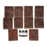 A SET OF TEN 19TH CENTURY GOTHIC REVIVAL CARVED OAK PANELS - probably Flemish each depicting figures