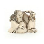 A MEIJI PERIOD JAPANESE IVORY NETSUKE modelled as Gama Sennin with toad 32mm high, signature to