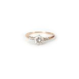 A LADIES 9CT GOLD SOLITAIRE DIAMOND RING app. 0.5ct, with diamond-set shoulders, 1.4g