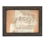 A FRAGMENT OF ANTIQUE CLOTH WITH EGYPTIAN HIEROGLYPHICS - mounted in a later glazed frame 15cm