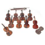 A COLLECTION OF 9 VIOLINS AND 8 VIOLIN BOWS including a lion head Mittenwald violin, length of