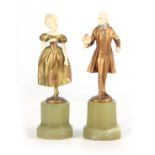 FERDINAND PREISS (1882-1943). AN EARLY 20TH CENTURY PAIR OF SMALL IVORY AND PAINTED BRONZE