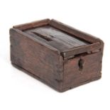 A RARE 16TH CENTURY OAK MONEY BOX with a sliding top the lock missing 10cm wide 7cm wide 5cm high.