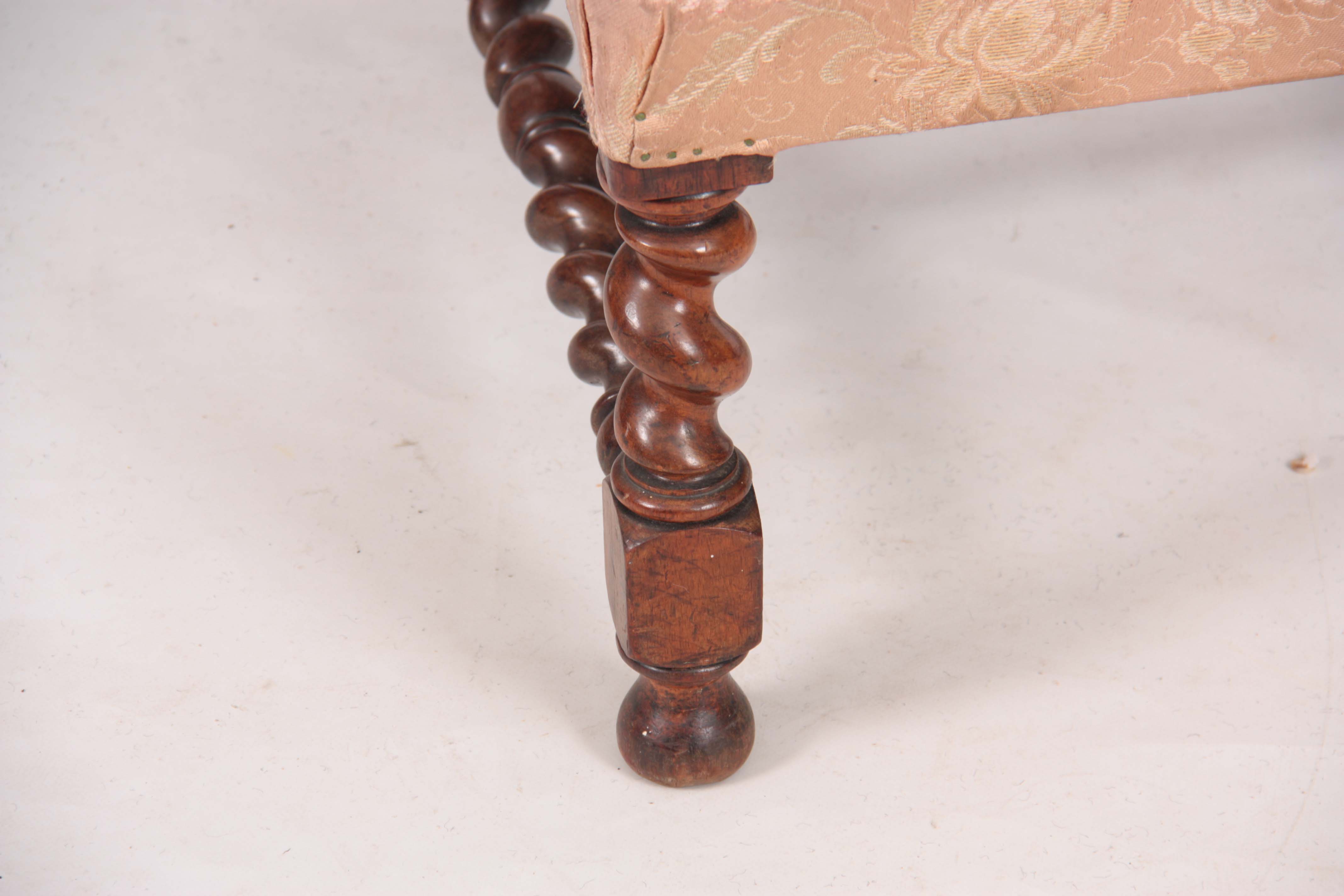 A MID VICTORIAN ROSEWOOD UPHOLSTERED ROSEWOOD NURSING CHAIR with leaf carved top rail, barley - Image 4 of 6