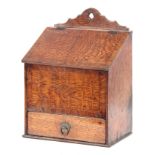 AN 18TH CENTURY WALNUT CROSS-BANDED OAK CANDLE BOX with angled hinged lid above a frieze drawer