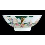 AN 18TH CENTURY CHINESE FAMILLE VERTE POLYCHROME FOOTED BOWL decorated with a continuous band of