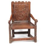 AN 18TH CENTURY OAK WAINSCOT CHAIR OF SMALL PROPORTIONS having carved back, dated 1731 with open