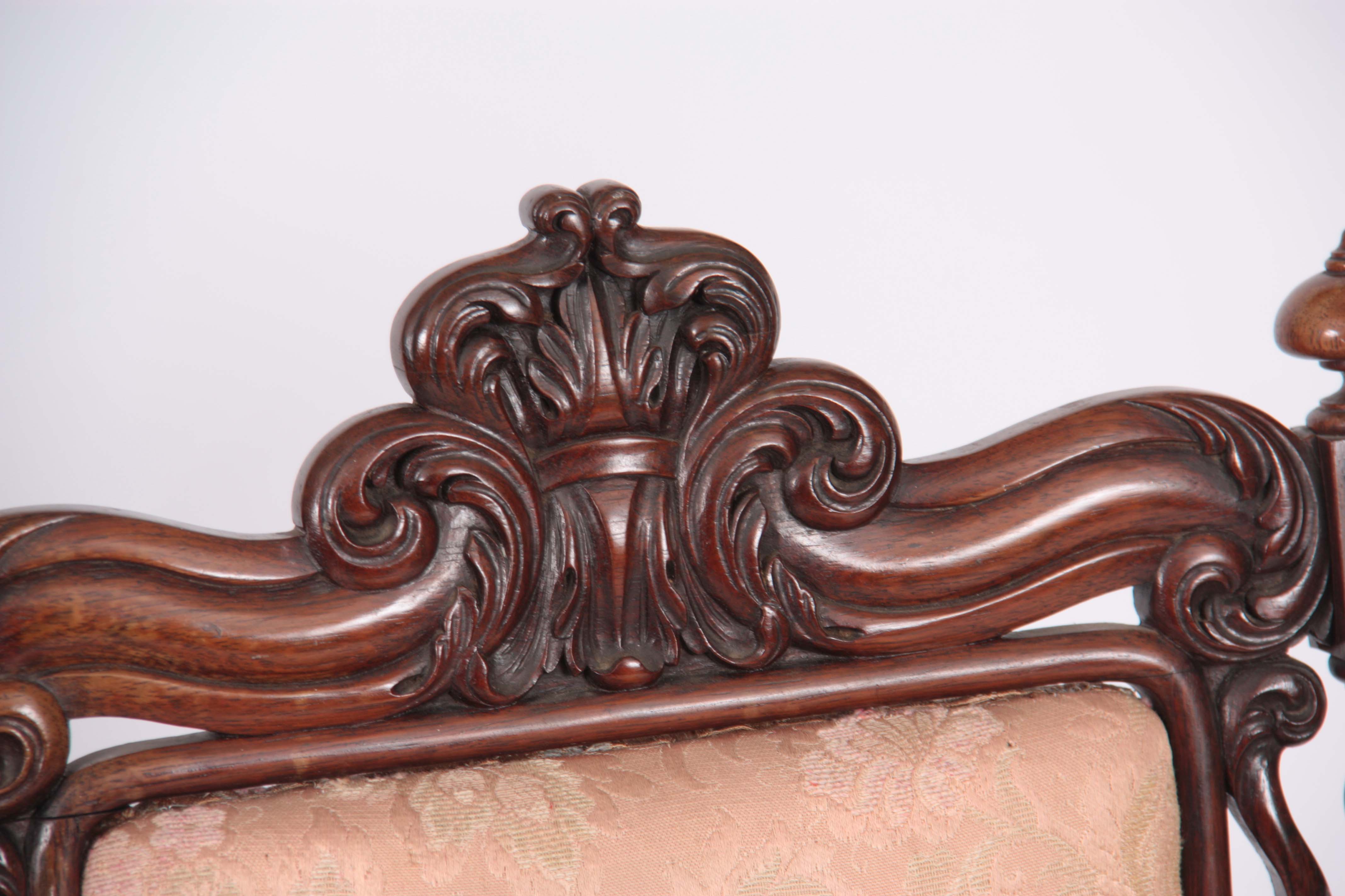 A MID VICTORIAN ROSEWOOD UPHOLSTERED ROSEWOOD NURSING CHAIR with leaf carved top rail, barley - Image 2 of 6