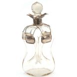 A GEORGE V SILVER MOUNTED SPIRIT DECANTER AND STOP