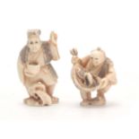A PAIR OF JAPANESE IVORY NETSUKE one modelled as a