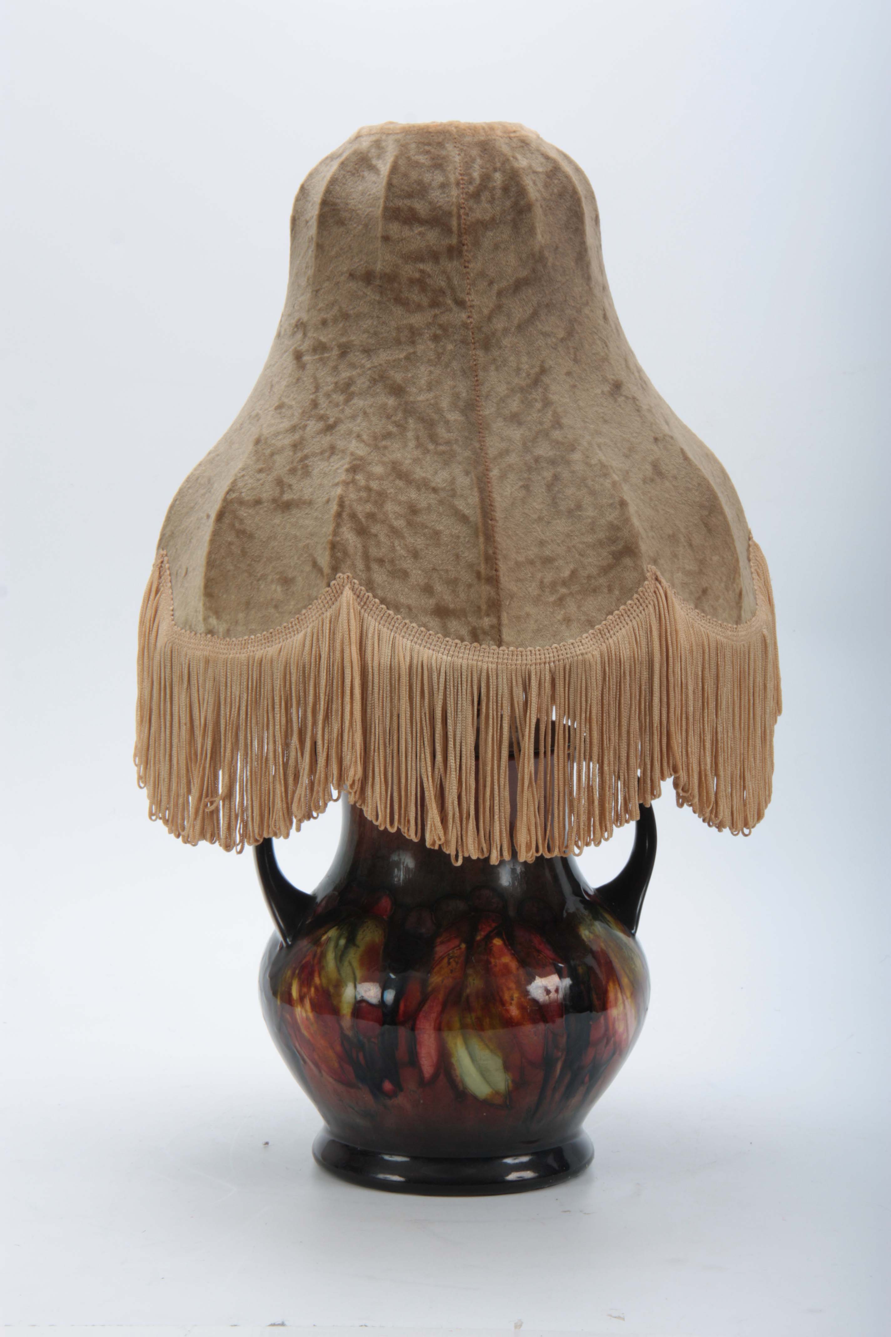 A 20TH CENTURY MOORCROFT LEAVES AND BERRY PATTERN TWIN HANDLED LAMP having flambe glaze with - Image 2 of 11