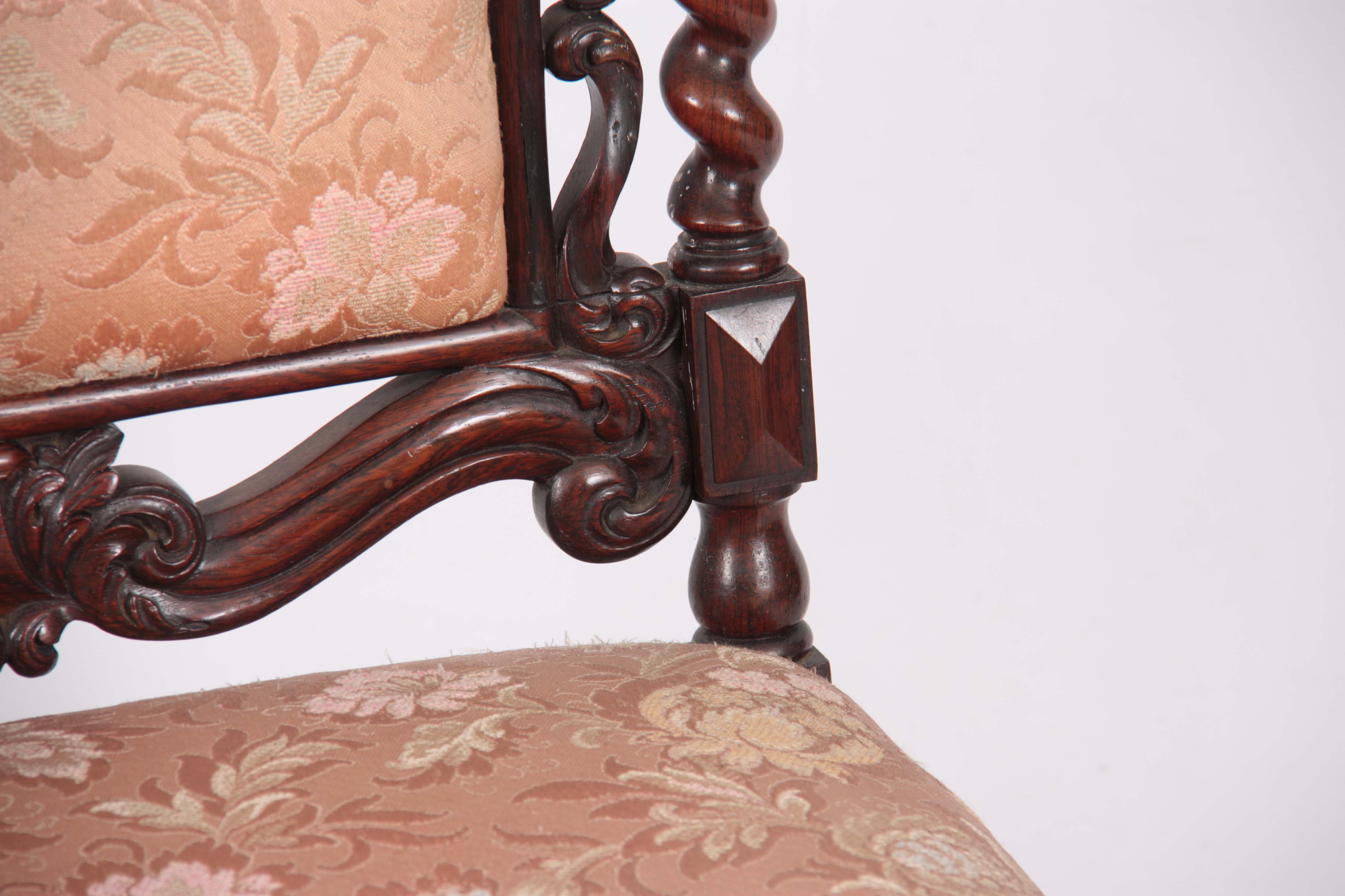 A MID VICTORIAN ROSEWOOD UPHOLSTERED ROSEWOOD NURSING CHAIR with leaf carved top rail, barley - Image 3 of 6