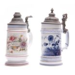 TWO 20TH CENTURY GERMAN STEINS WITH ORNATE HINGED