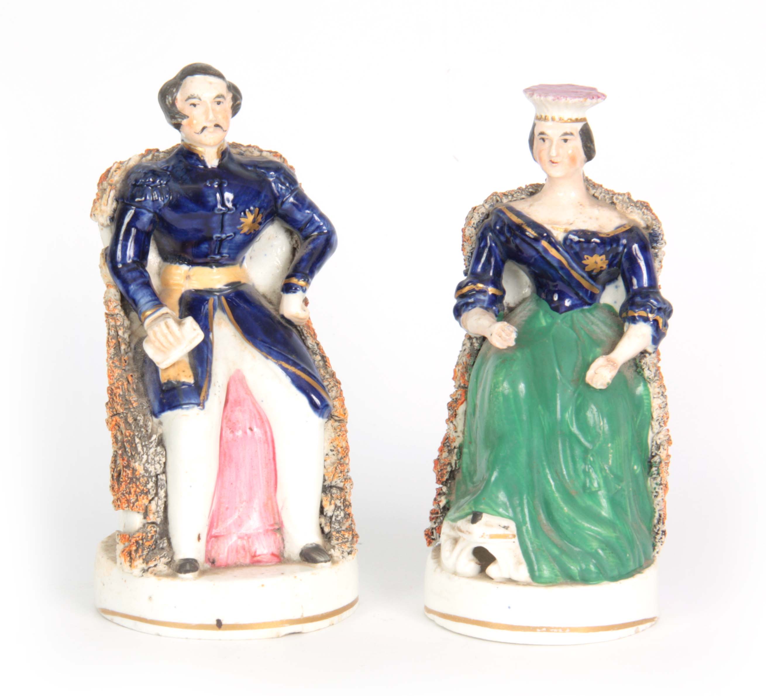 A PAIR OF 19TH CENTURY STAFFORDSHIRE FIGURES depic