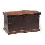 AN 18TH CENTURY WALNUT OFFICERS TRUNK with iron mounted corners and strapped sides with carrying