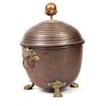 A 19TH CENTURY REGENCY COPPER AND BRASS LIDDED COA