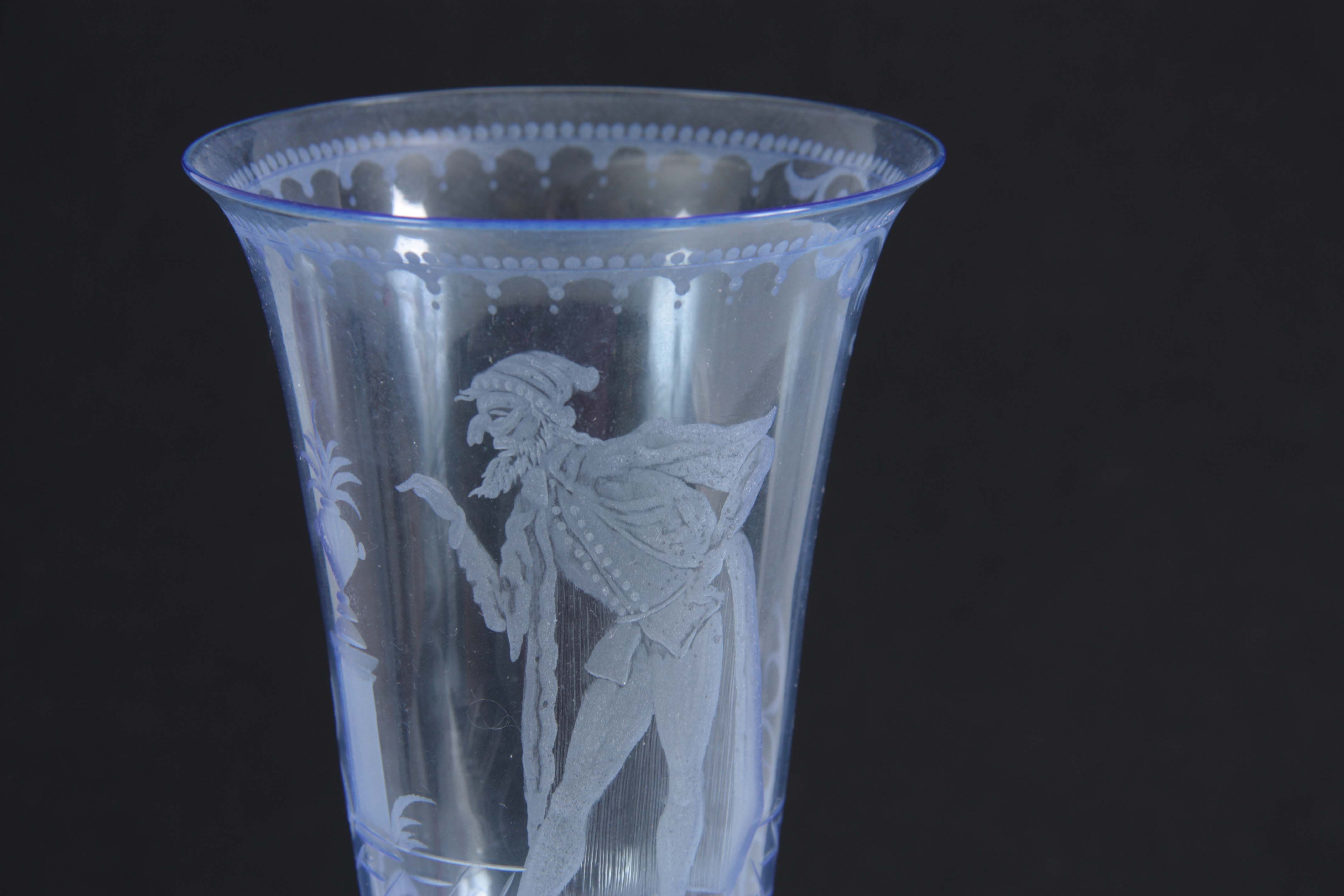 A FINE 20TH CENTURY BLUE STAINED DRINKING GLASS with fluted bowl engraved with a Gentleman set in - Image 2 of 3