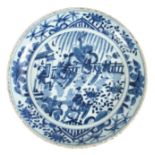 A 17TH / 18TH CENTURY CHINESE BLUE AND WHITE DISH decorated with figures in a garden and on horse