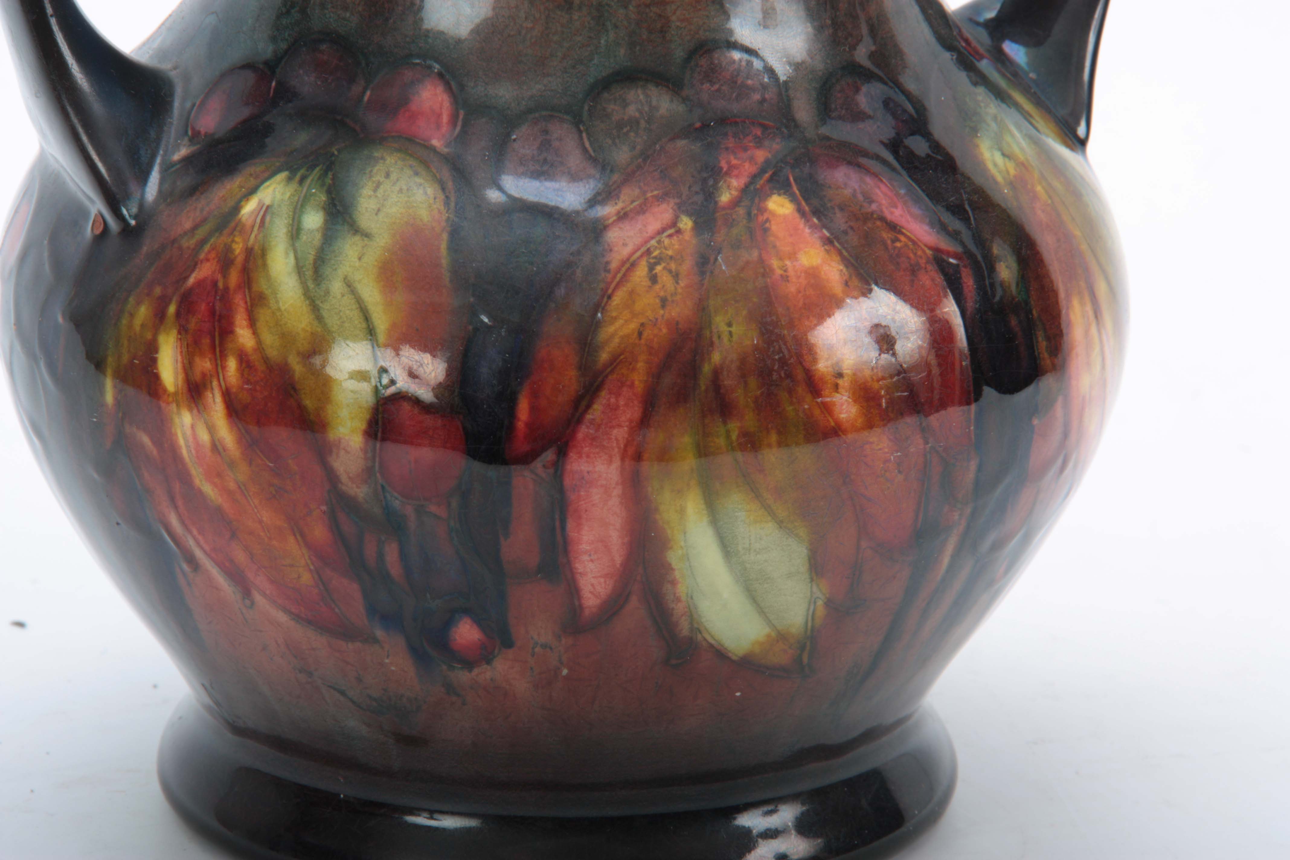 A 20TH CENTURY MOORCROFT LEAVES AND BERRY PATTERN TWIN HANDLED LAMP having flambe glaze with - Image 4 of 11