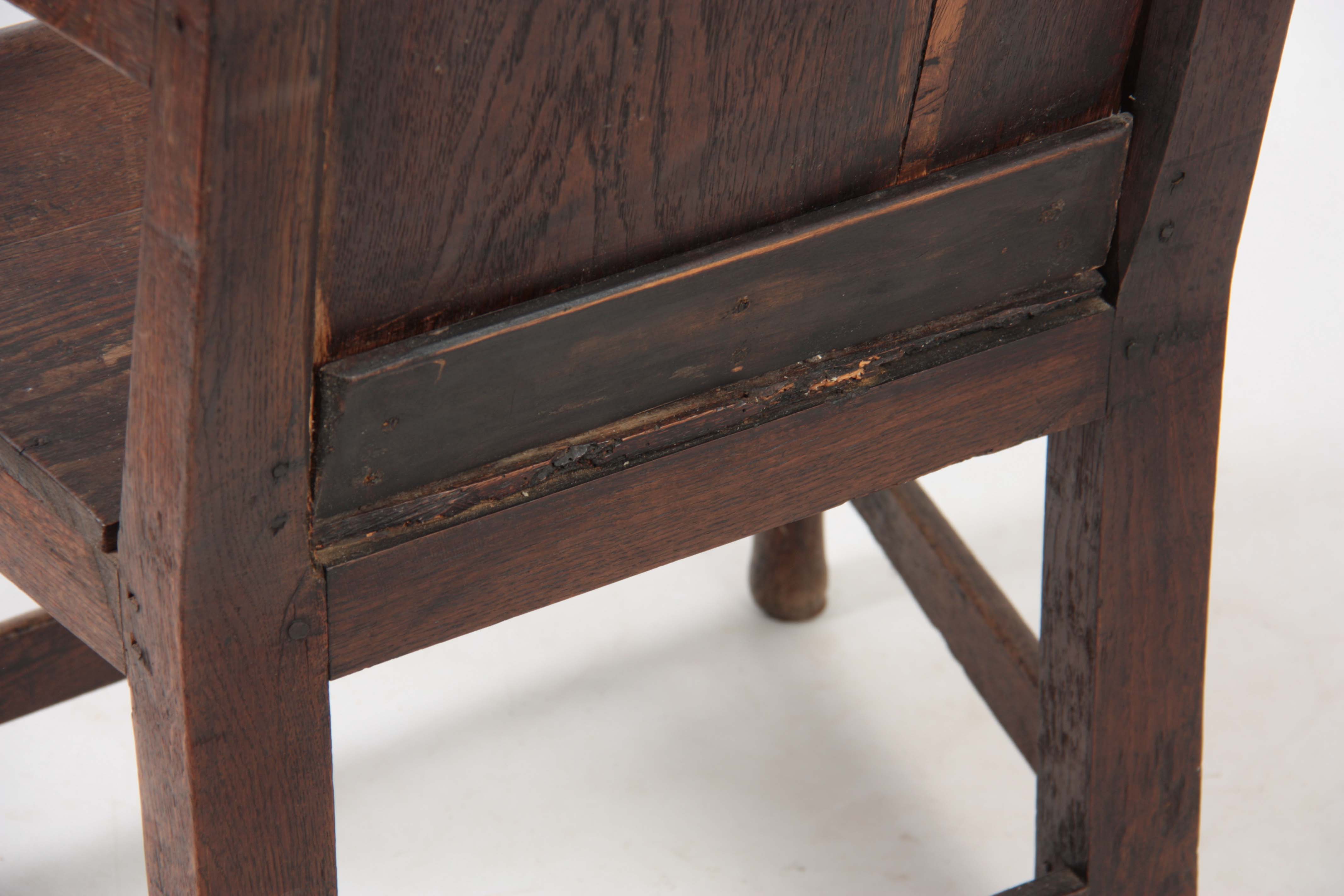 AN EARLY 18TH CENTURY OAK WAINSCOT CHAIR having fielded panel back with open arms and turned - Image 5 of 5