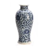 A CHINESE BLUE AND WHITE VASE having floral swag decoration 23cm high.