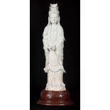 A LARGE 18th CENTURY CHINESE BLANC DE CHINE GUANYIN FIGURE mounted on a later wooden base 66cm