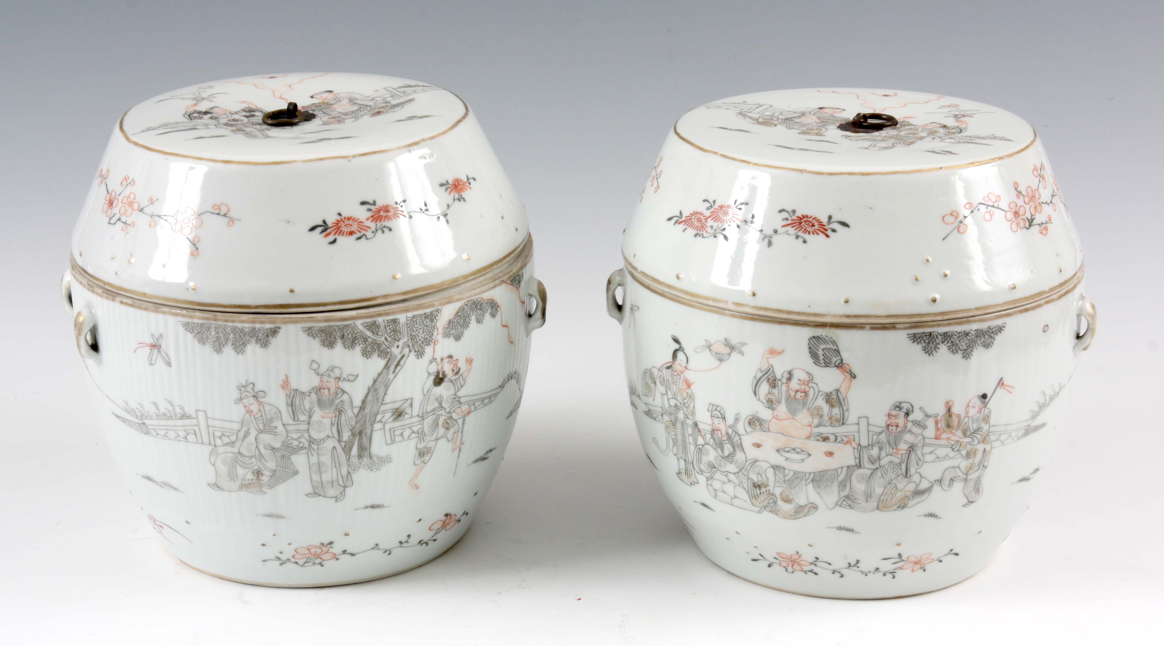 A PAIR OF 19TH CENTURY CHINESE STORAGE JARS AND COVERS with angled shaped lids and bulbous bodies,