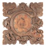 A 19TH CENTURY CHINESE HARDWOOD TABLE TOP WITH RELIEF CARVED DRAGON having glass eyes surrounding on