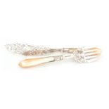 A PAIR OF VICTORIAN SILVER AND MOTHER-OF-PEARL FISH SERVERS with gadrooned carved handles and