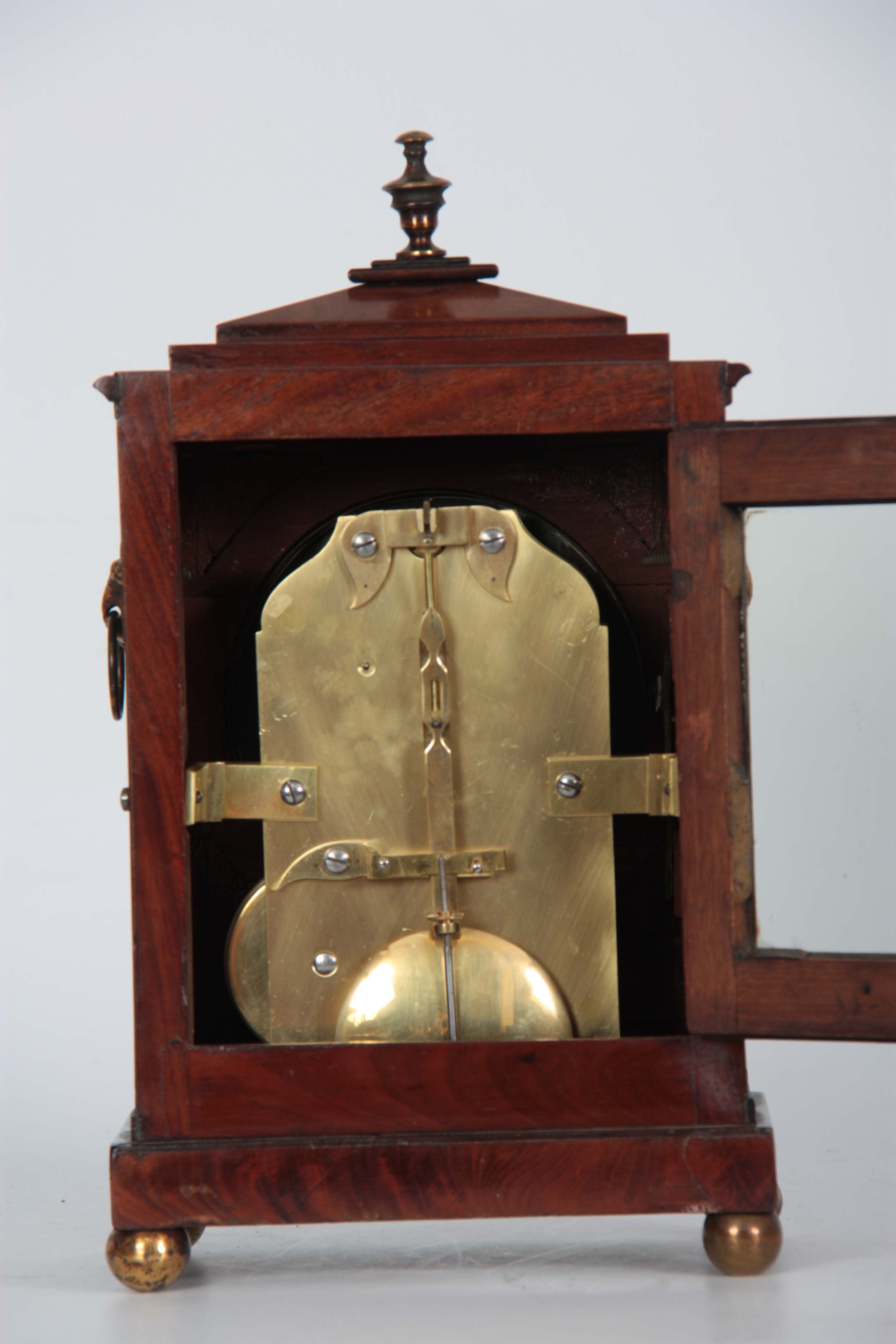 A GOOD REGENCY MAHOGANY STEPPED CHAMFER TOP AND BRASS MOUNTED BRACKET CLOCK OF SMALL SIZE with brass - Image 6 of 7