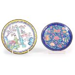 AN ORIENTAL ENAMELED SHALLOW DISH with colourful figures and garden scene to the centre within a