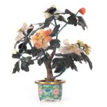 A 20TH CENTURY CHINESE COLOURED HARDSTONE TREE with flower head leafing branch work and cloisonne