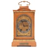 A LATE 19TH CENTURY SATINWOOD QUARTER CHIMING BRACKET CLOCK with breakfront pediment surmounted by a