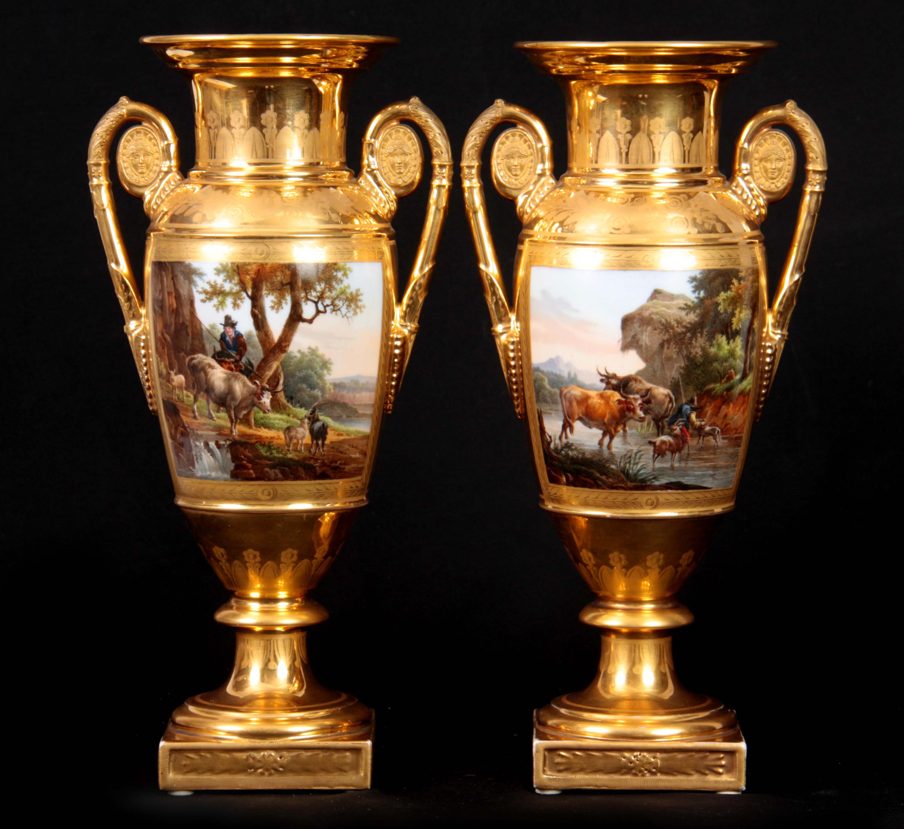 A PAIR OF EARLY 19TH CENTURY FRENCH EMPIRE PORCELAIN VASES of classical urn-shape with medallion-set