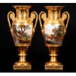 A PAIR OF EARLY 19TH CENTURY FRENCH EMPIRE PORCELAIN VASES of classical urn-shape with medallion-set