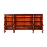 A SUPERB OVERSIZED REGENCY MAHOGANY OPEN BOOKCASE IN THE MANNER OF THOMAS HOPE having graduated