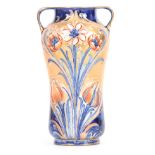 AN EARLY 20th CENTURY TWO HANDLED MOORCROFT MACINTYRE 'ALHAMBRA' VASE having stylised painted and