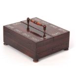 A 19TH CENTURY ROSEWOOD AND MOTHER OF PEARL INLAID PORTABLE INK STAND the turned handle with