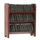 A SET OF WILLIAM SHAKESPEARE MINIATURE BOOKS housed a wooden bookcase, Allied Newspapers Ltd, 200