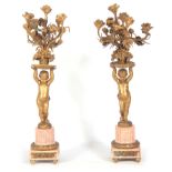 A LARGE PAIR OF 19TH CENTURY FRENCH ORMOLU CANDELABRA having six flower head branch-work tops,