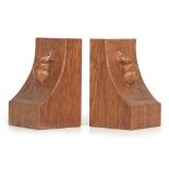A PAIR OF ROBERT 'MOUSEMAN' THOMPSON ADZED OAK BOOKENDS each with a carved mouse trademark to the