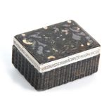 AN UNUSUAL 19TH CENTURY PRESSED TORTOISESHELL BOX with bright cut Silver border to the lid enclosing