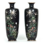A PAIR OF JAPANESE MEIJI PERIOD CLOISONNE ENAMEL VASES having dark blue ground decorated with