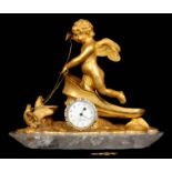 AN UNUSUAL 19TH CENTURY FRENCH GILT BRONZE AND ROCK CRYSTAL SMALL MANTEL CLOCK with wavey edge