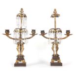 A PAIR OF 19TH CENTURY REGENCY BRONZE AND GILT BRONZE TWO BRANCH CANDELABRA with two-tier draping