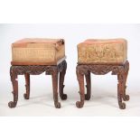A PAIR OF 19TH CENTURY CARVED OAK UPHOLSTERED STOOLS having elaborate leaf moulded frames and