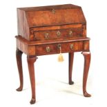 A LATE 17TH CENTURY HERRING-BANDED WALNUT BUREAU ON STAND with angled fall revealing a fitted