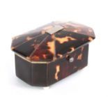 A 19TH CENTURY TORTOISESHELL MINIATURE DRESSING TABLE BOX with silver-lined tent top and canted