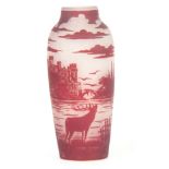 DEVEAU. AN EARLY 20th CENTURY GLASS VASE with frosted white glass and dark red overlay depicting a